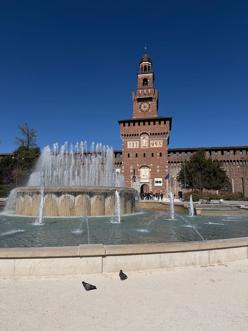Brick facade and tower of Castello Sforzesco castle in Milan