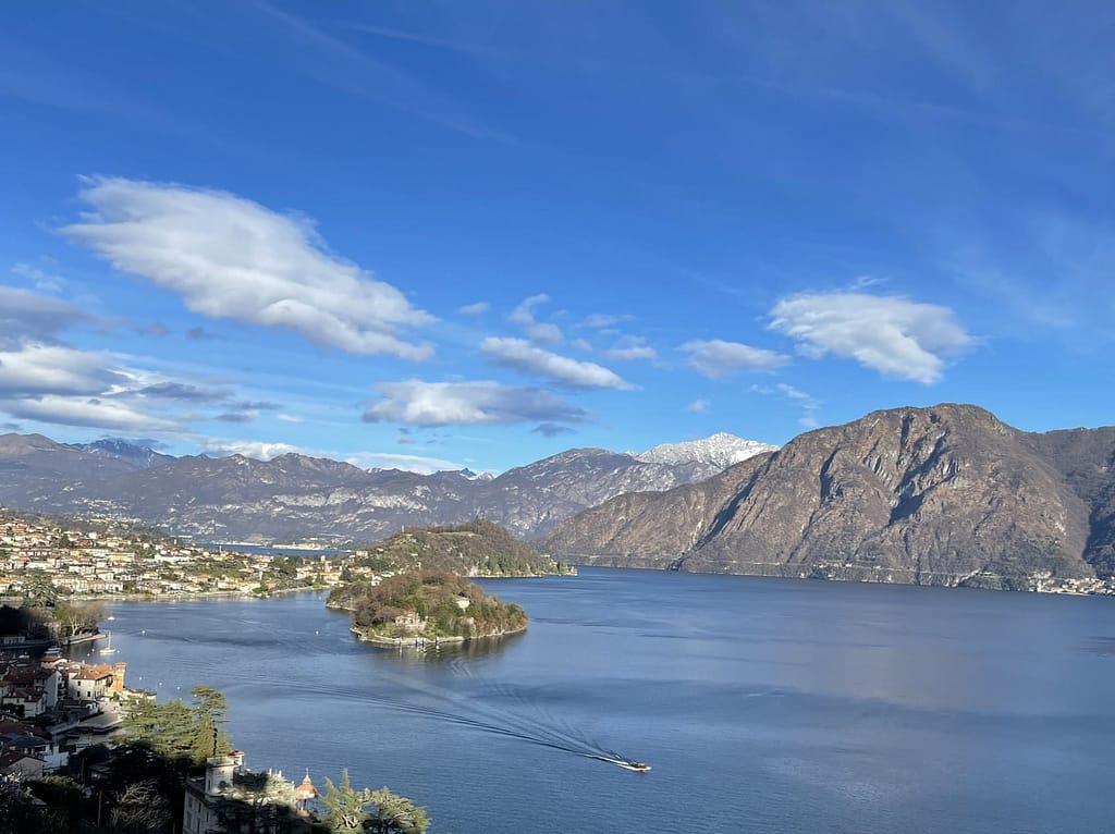 Scenic view from the Greenway overlooking Isola Comacina and Villa del Balbianello during Easter in Lake Como