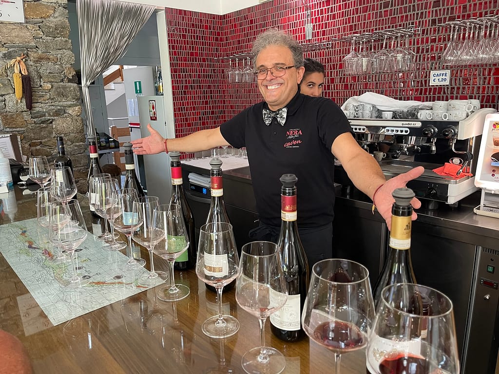 Selection of amazing wines in Nera Vini WineBar in Chiuro on the Valtellina Wine Tour from Lake Como