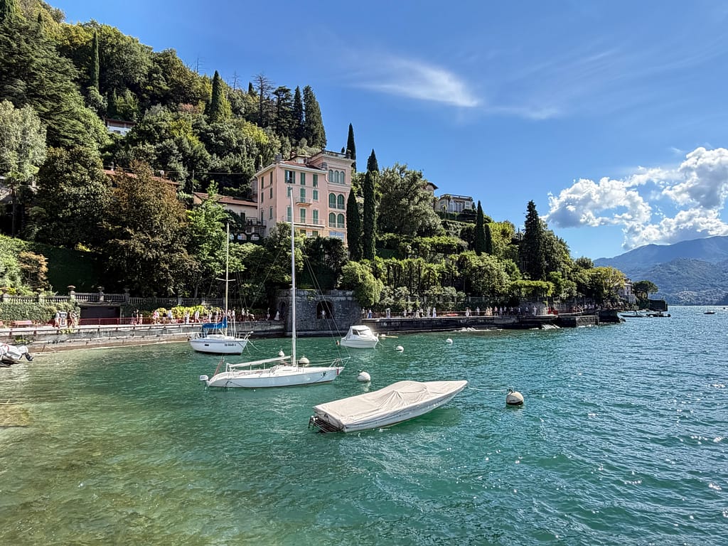 Lakeside pedestrian walkway in Varenna seen while arriving by boat