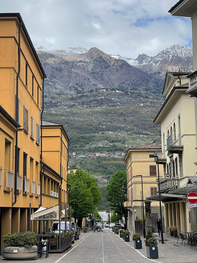 The scenic mountain view during a Valtellina wine tour from Lake Como by train.